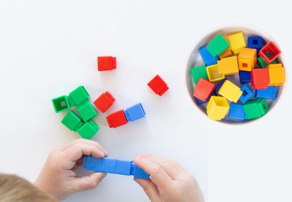 Teach students how to handle manipulatives and other math tools.